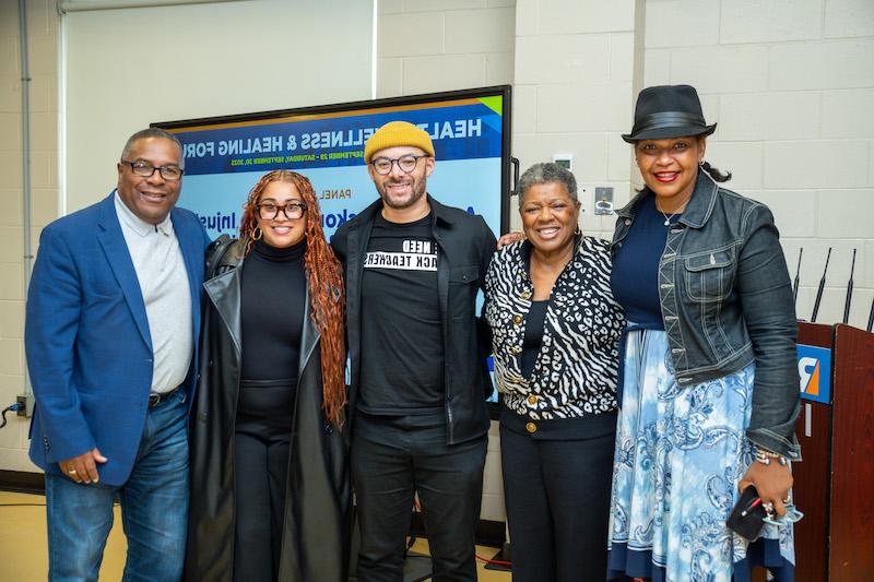 Brandy Cruthird, Jackie Jenkins-Scott, Devin Morris, Ivanna Solana, and Robert Lewis, Jr. following a morning of engaging panel discussions at the Reggie Lewis Center 